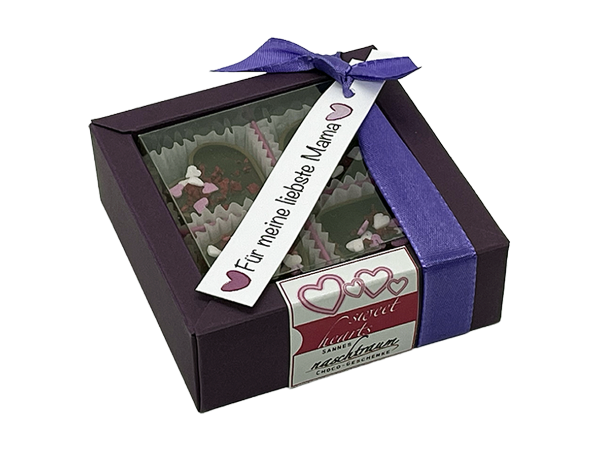 4 edle Herzpralinen in Geschenkverpackung