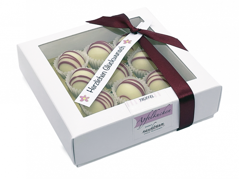 Edle Apfelkuchen-Trüffel in Geschenkverpackung mit Sannes Naschtraum Logo und Grußkarte
