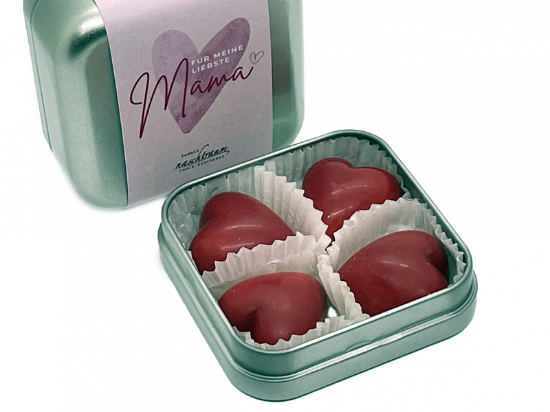 Silberne Metalldose zum Muttertag mit rosa Banderole, Herz-Design und roten Schokoladen-Nougatherzen von Sannes Naschtraum.
